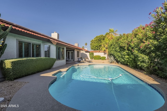 11085 E Becker Ln E, Scottsdale, AZ 85259 - view of pool with french doors, a patio area, and a fenced backyard