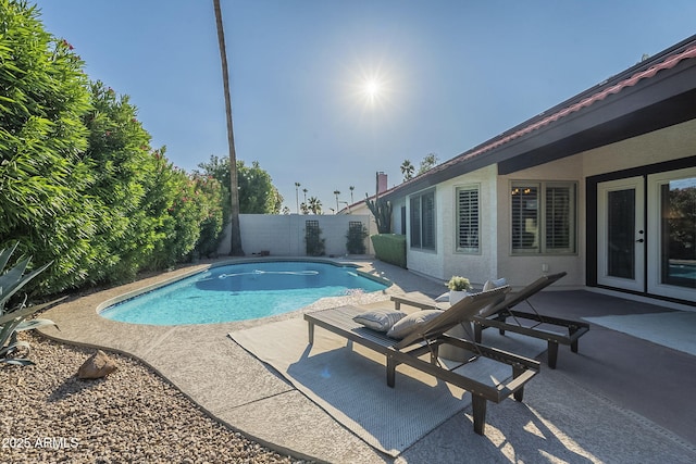 11085 E Becker Ln E, Scottsdale, AZ 85259 - view of pool featuring a patio area, a fenced backyard, and french doors