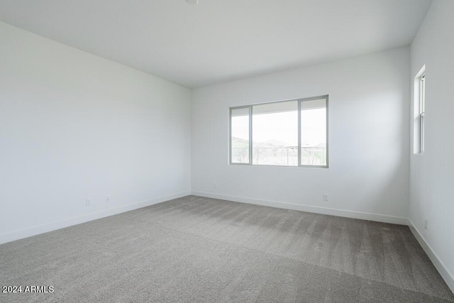 empty room featuring carpet floors