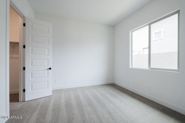 empty room featuring carpet floors