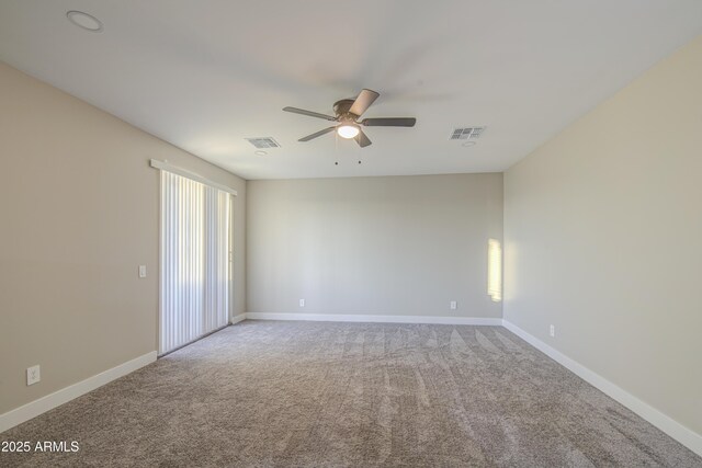 5945 W Lamar Rd, Glendale, AZ 85301 - spare room with a ceiling fan, carpet flooring, and baseboards