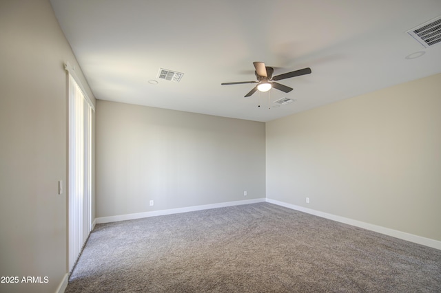 5945 W Lamar Rd, Glendale, AZ 85301 - spare room with a ceiling fan, carpet flooring, and baseboards