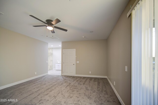 5945 W Lamar Rd, Glendale, AZ 85301 - unfurnished room with a ceiling fan, carpet, and baseboards