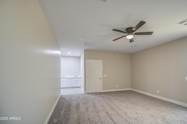 5945 W Lamar Rd, Glendale, AZ 85301 - carpeted spare room featuring baseboards and a ceiling fan