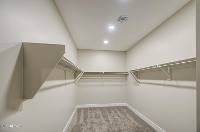 5945 W Lamar Rd, Glendale, AZ 85301 - spacious closet featuring carpet flooring
