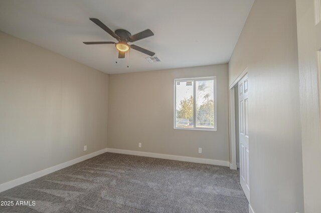 5945 W Lamar Rd, Glendale, AZ 85301 - carpeted empty room featuring a ceiling fan and baseboards