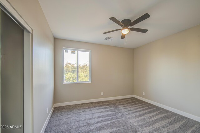 5945 W Lamar Rd, Glendale, AZ 85301 - carpeted spare room with ceiling fan and baseboards