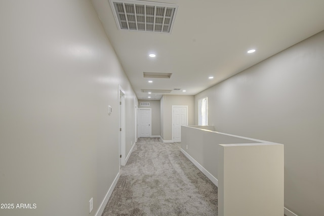 5945 W Lamar Rd, Glendale, AZ 85301 - corridor featuring carpet floors, recessed lighting, baseboards, and an upstairs landing