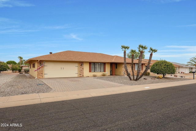 ranch-style home with a garage