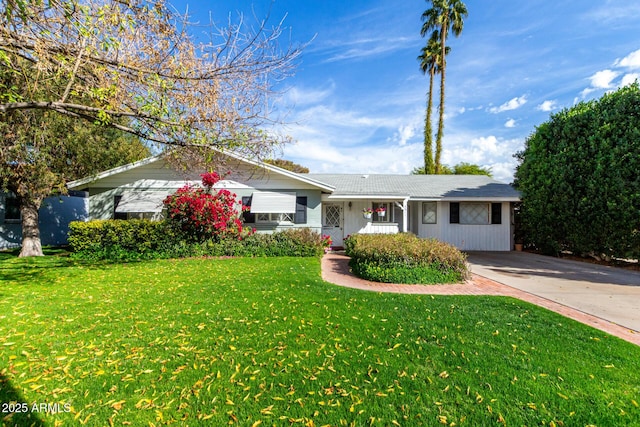 ranch-style house with a front yard