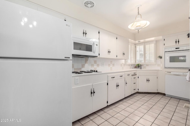 kitchen with backsplash, white appliances, decorative light fixtures, and white cabinets