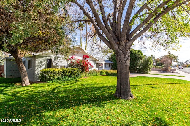 exterior space with a front yard