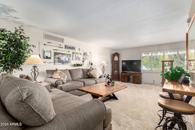 living room with light colored carpet