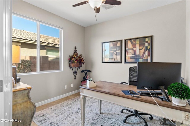 office space with ceiling fan