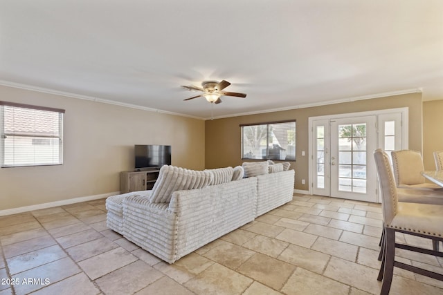 12748 N 57th Dr, Glendale, AZ 85304 - living area with ceiling fan, healthy amount of natural light, crown molding, and baseboards