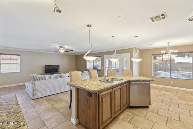 12748 N 57th Dr, Glendale, AZ 85304 - kitchen with stainless steel dishwasher, a sink, ornamental molding, healthy amount of natural light, and brown cabinetry