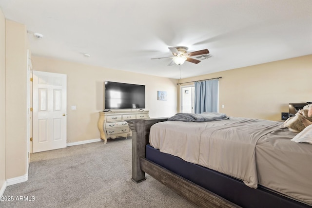 12748 N 57th Dr, Glendale, AZ 85304 - bedroom with light carpet, a ceiling fan, and baseboards