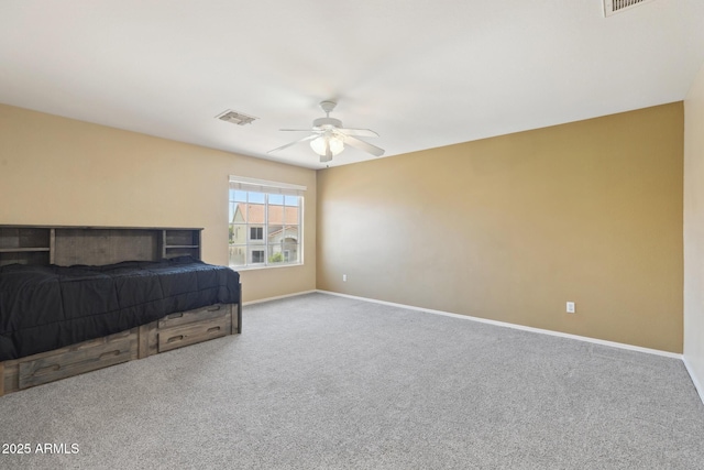 12748 N 57th Dr, Glendale, AZ 85304 - bedroom with baseboards, carpet floors, and a ceiling fan