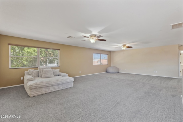 12748 N 57th Dr, Glendale, AZ 85304 - living area with a ceiling fan, carpet, and baseboards