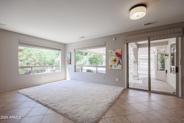 view of tiled empty room