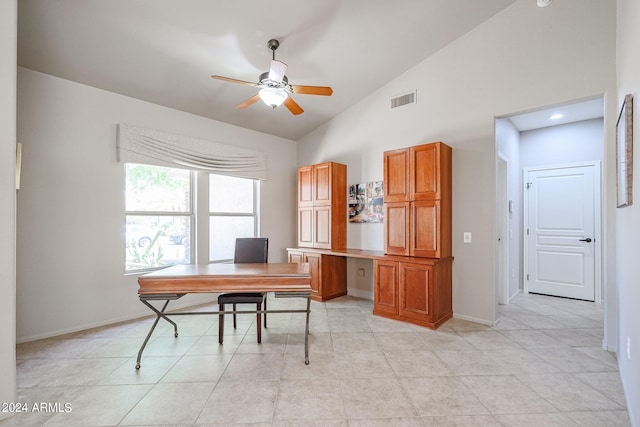 home office with lofted ceiling and ceiling fan