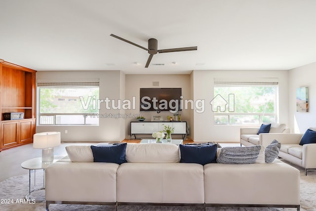 living room featuring ceiling fan