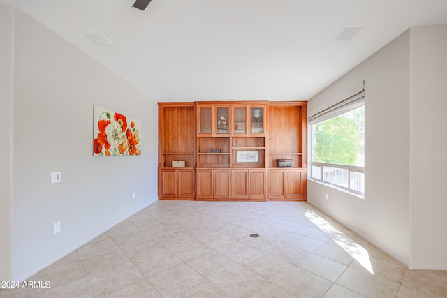 empty room with light tile patterned floors