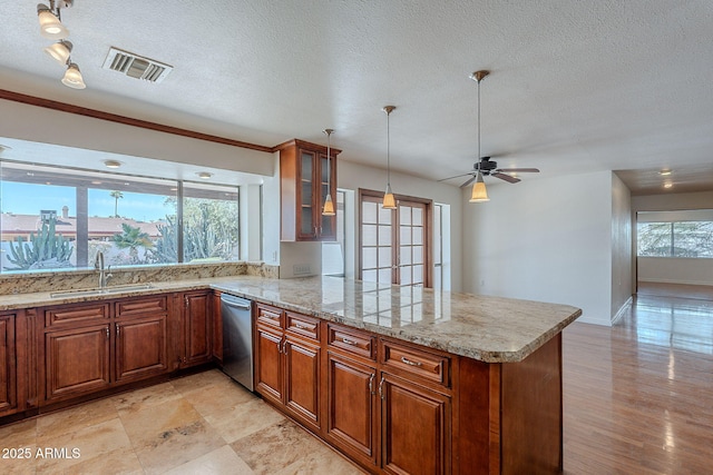 5539 E Dahlia Dr, Scottsdale, AZ 85254 - kitchen featuring stainless steel dishwasher, a sink, a peninsula, brown cabinetry, and glass insert cabinets