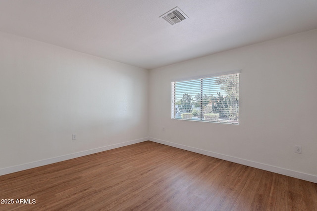 5539 E Dahlia Dr, Scottsdale, AZ 85254 - empty room with light wood-style floors and baseboards