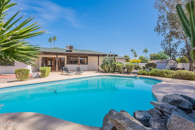 5539 E Dahlia Dr, Scottsdale, AZ 85254 - view of swimming pool with a patio area and french doors