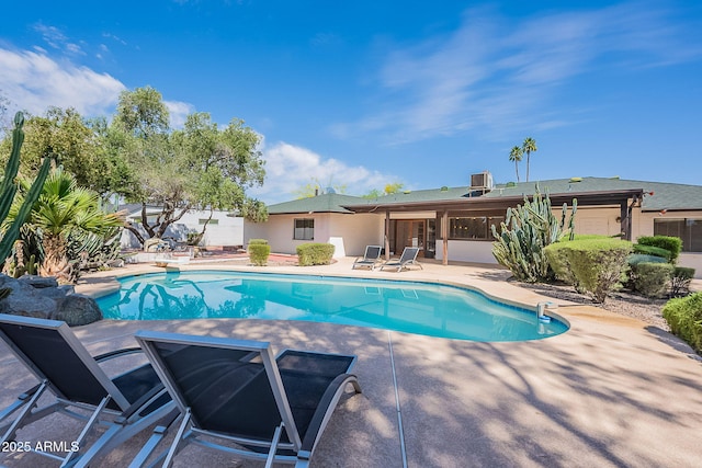 5539 E Dahlia Dr, Scottsdale, AZ 85254 - swimming pool featuring a patio area, a diving board, and central AC
