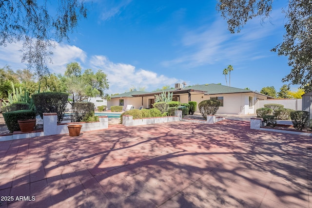 5539 E Dahlia Dr, Scottsdale, AZ 85254 - ranch-style house with an outdoor pool and a patio