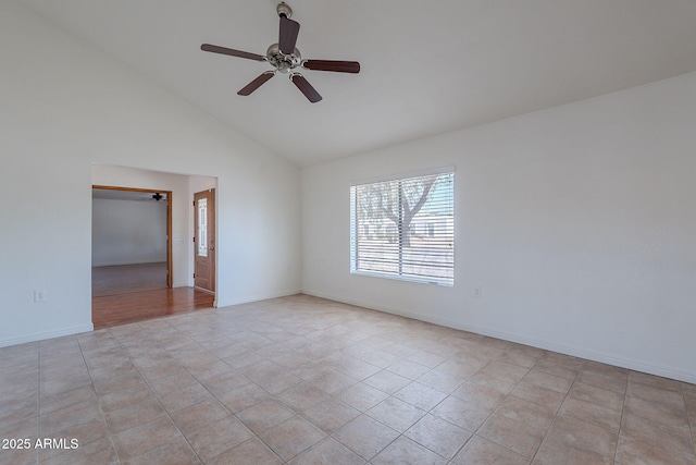 5539 E Dahlia Dr, Scottsdale, AZ 85254 - spare room featuring ceiling fan, baseboards, light tile patterned floors, and high vaulted ceiling