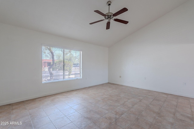 5539 E Dahlia Dr, Scottsdale, AZ 85254 - spare room featuring vaulted ceiling, ceiling fan, light tile patterned floors, and baseboards