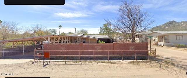 exterior space featuring a mountain view