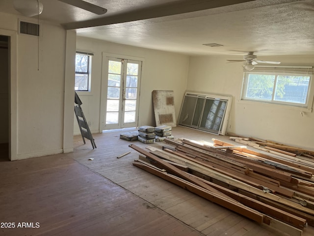 miscellaneous room with ceiling fan and french doors