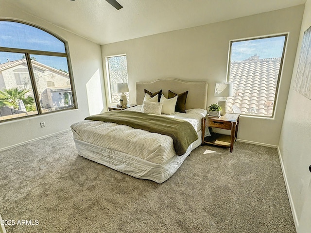 bedroom featuring carpet flooring, a ceiling fan, and baseboards