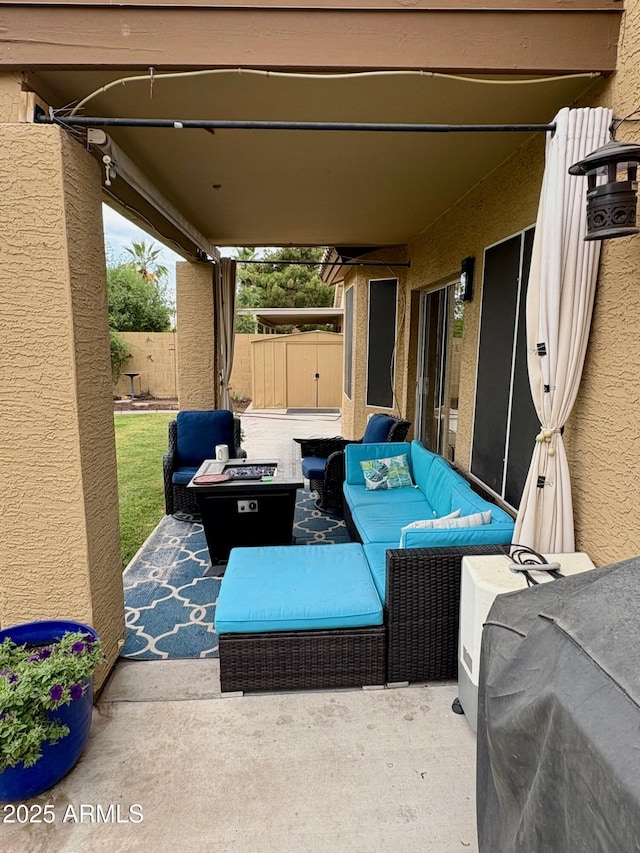 135 S Abalone Dr, Gilbert, AZ 85233 - view of patio / terrace featuring an outdoor living space with a fire pit