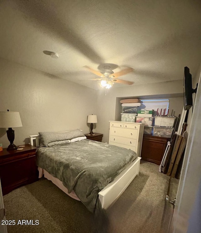 135 S Abalone Dr, Gilbert, AZ 85233 - bedroom with light colored carpet, a textured ceiling, and a ceiling fan