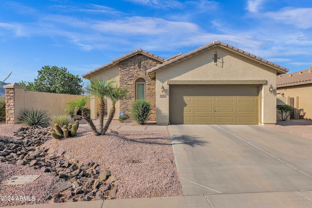 view of front of property featuring a garage