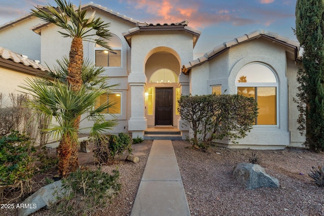 3037 E Bighorn Ave, Phoenix, AZ 85048 - view of front of property with a tile roof and stucco siding