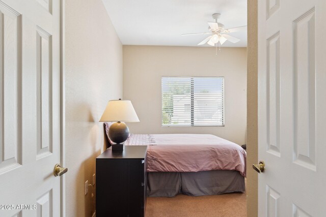 9555 E Raintree Dr E Unit 2061, Scottsdale, AZ 85260 - bedroom featuring carpet flooring and ceiling fan