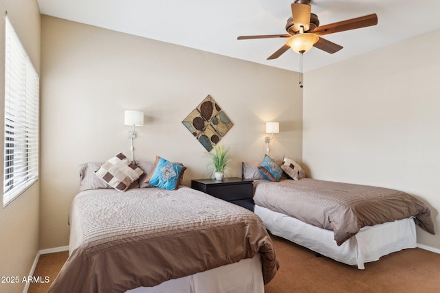 9555 E Raintree Dr E Unit 2061, Scottsdale, AZ 85260 - carpeted bedroom featuring a ceiling fan and baseboards