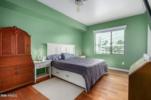 bedroom featuring ceiling fan and light hardwood / wood-style flooring