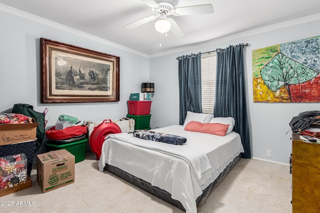 carpeted bedroom with crown molding and ceiling fan