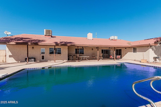 view of pool featuring central AC, a patio area, and ceiling fan