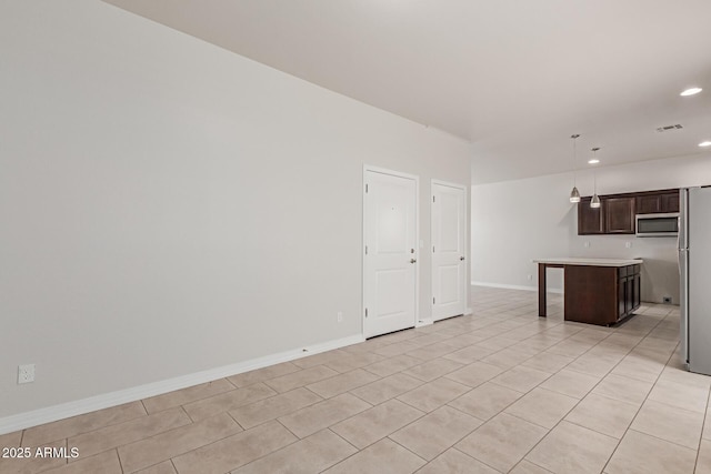 2000 N 36th St Unit 41, Phoenix, AZ 85008 - unfurnished living room featuring recessed lighting and light tile patterned flooring