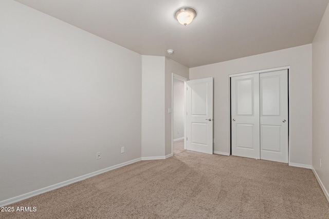 2000 N 36th St Unit 41, Phoenix, AZ 85008 - unfurnished bedroom featuring light colored carpet and a closet