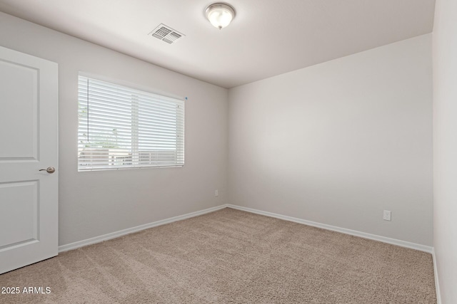2000 N 36th St Unit 41, Phoenix, AZ 85008 - spare room with light carpet and baseboards