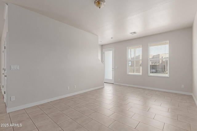 2000 N 36th St Unit 41, Phoenix, AZ 85008 - unfurnished room with baseboards and light tile patterned floors